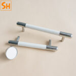 Tay nắm tủ inox phối da đa sắc BXP00111